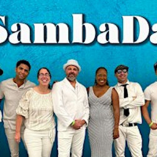 A group of people dressed in white posing under the text 