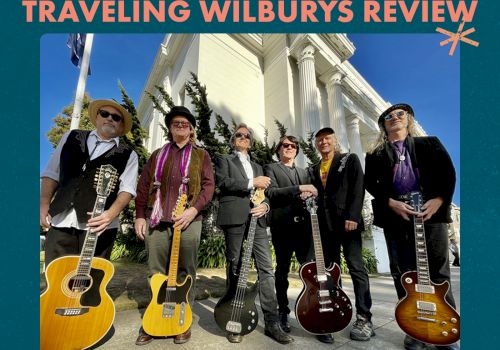 Poster for the Traveling Wilburys Review featuring five musicians with guitars in front of a white building. Event at The Flamingo Hotel on Oct 5, 2024.